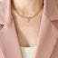 Letter pendant necklace in brass with zircon inlay — primary view