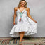 Ivory tiered cami midi dress with embroidered tassel tie — primary view
