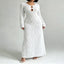 Textured Cut-Out Long Sleeve Maxi Dress — primary view