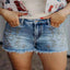 Western embroidered studded denim shorts — primary view