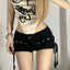 Black High-Waist Lace-Up Denim Shorts, shown in a clear product image