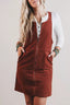 Model wearing the Ribbed Corduroy Zip-Up Sleeveless Pocket Sheath Dress