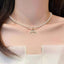 Mermaid tail pendant necklace with pearl and zircon — primary view