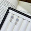 Zircon pearl drop earrings in silver-plated alloy — primary view