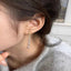 Sparkling pearl and zircon drop earrings — primary view