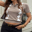 Model wearing the Argyle Patterned Short Sleeve Sweater