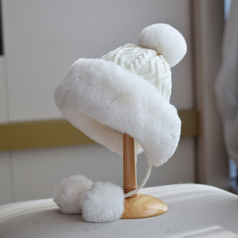 White pom-pom lace-up winter hat for women