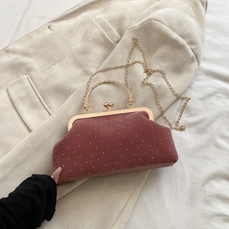 Shell crossbody bag shown from back angle