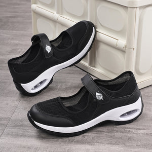 Black mesh slip-on sneakers