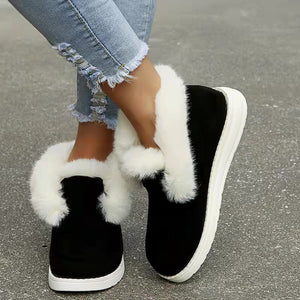 Black plush-lined slip-on ankle snow boots