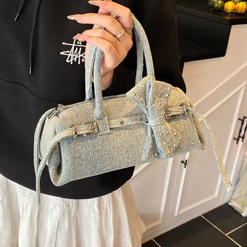 Denim Bow Crossbody Bag, shown in a clear product image