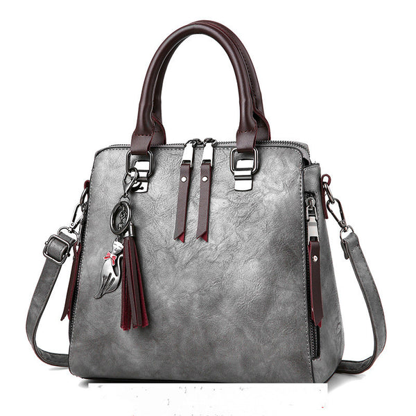 Vintage PU Leather Tassel Top-Handle Tote Bag for Women, angled product view