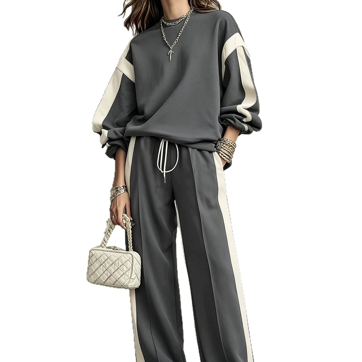 Charcoal sweatshirt and wide-leg pants set with cream contrast panels, worn by a model