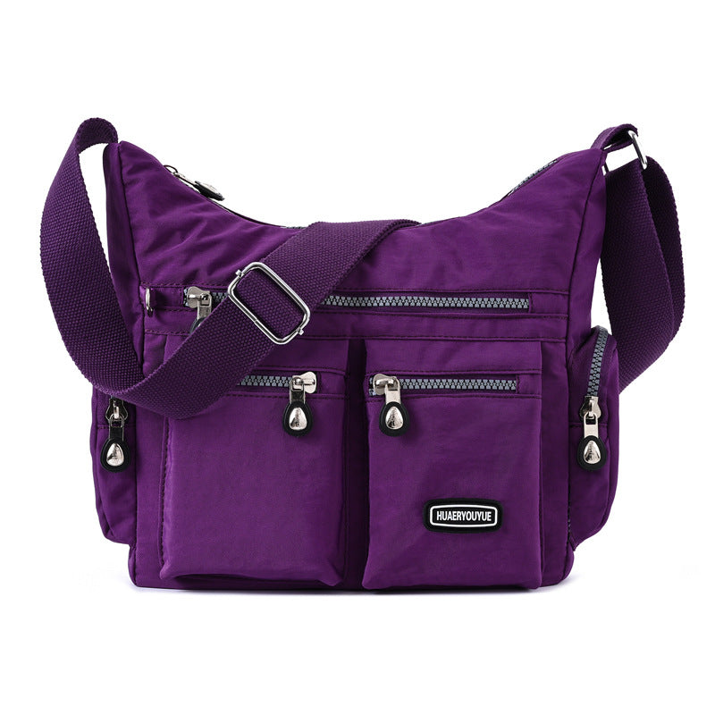 Water-Resistant Nylon Crossbody Bag for Women - Multi-Pocket Shoulder Bag, angled product view