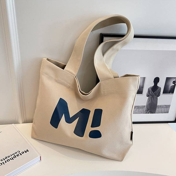 Bear motif bag shown styled with an outfit