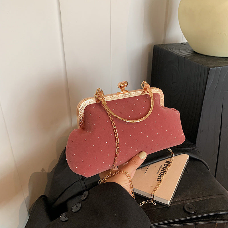 Shell crossbody bag shown carried crossbody