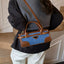 Denim patchwork crossbody bag with buckle detail — primary view