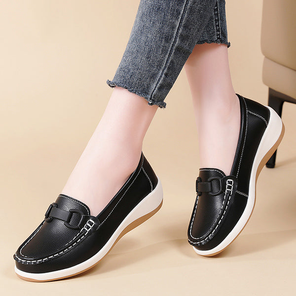 Black slip-on platform sneakers