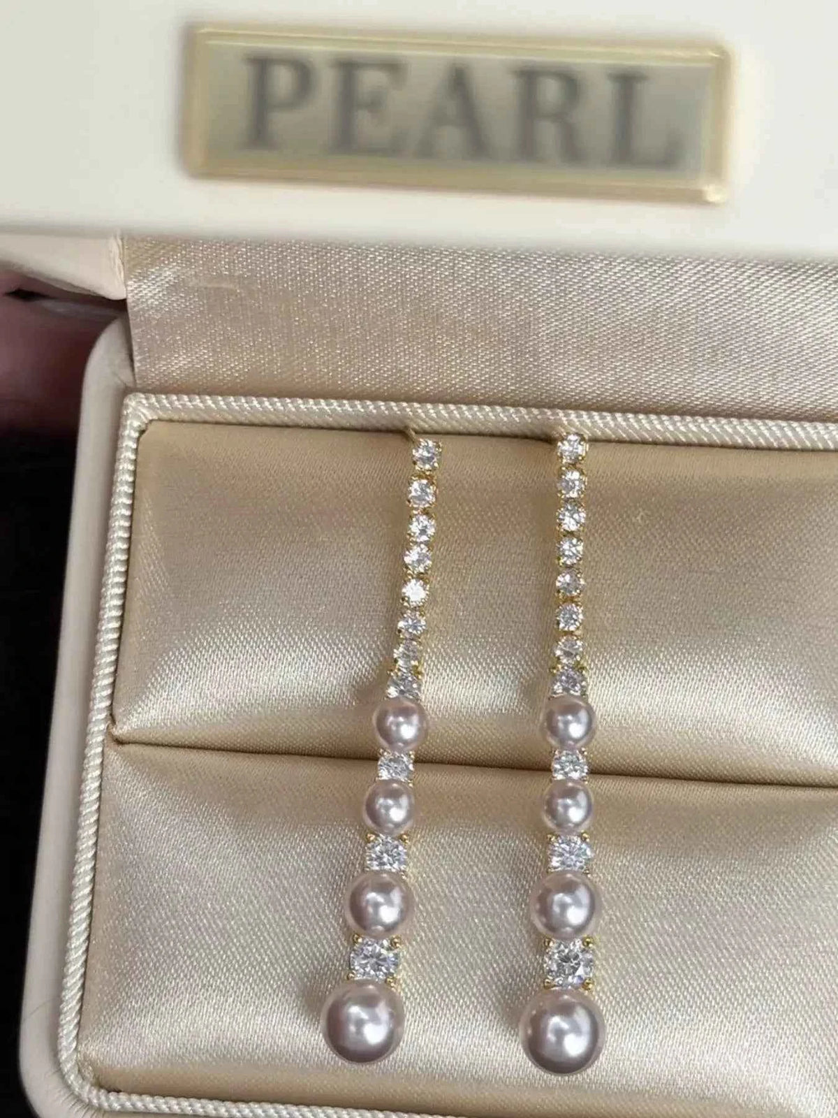 Sparkling Pearl Zircon Drop Earrings, angled product view