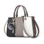 Patchwork Pompom Tote Bag - PU Leather Party Purse for Women, shown in a clear product image