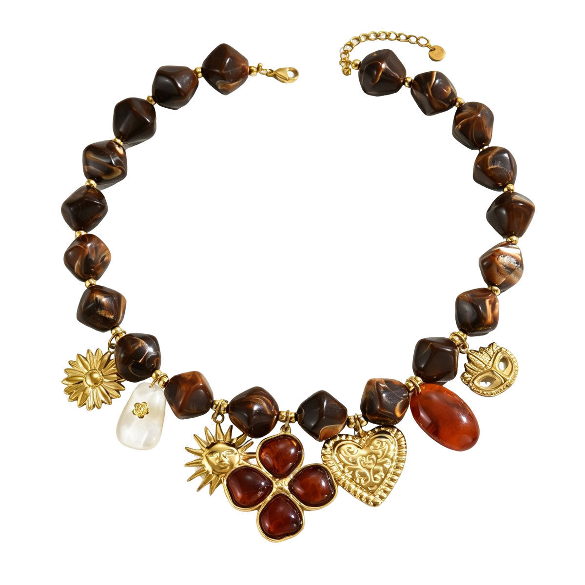 Brown beaded necklace with gold-tone heart, flower and leaf charms on white
