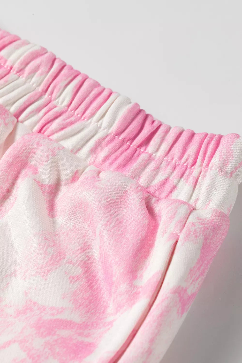 A relaxed two-piece set with a loose-fit hoodie and matching straight-leg shorts, product view 12