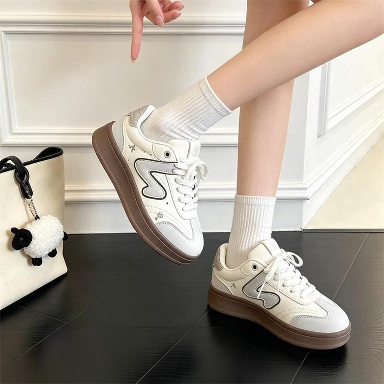 Star print sneakers side view