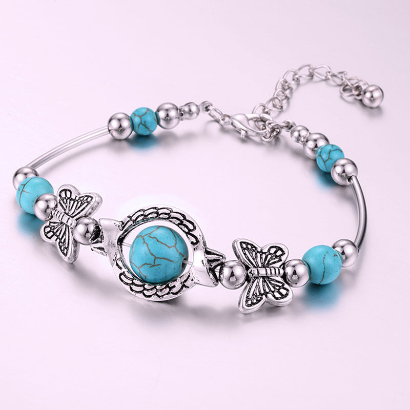 Turquoise Butterfly Alloy Bracelet, shown in a clear product image