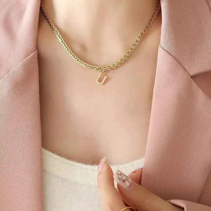 Letter pendant necklace in brass with zircon inlay — additional view 5