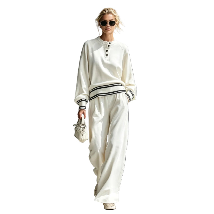 Cream button-neck top and wide-leg pants set with striped trim, worn by a model