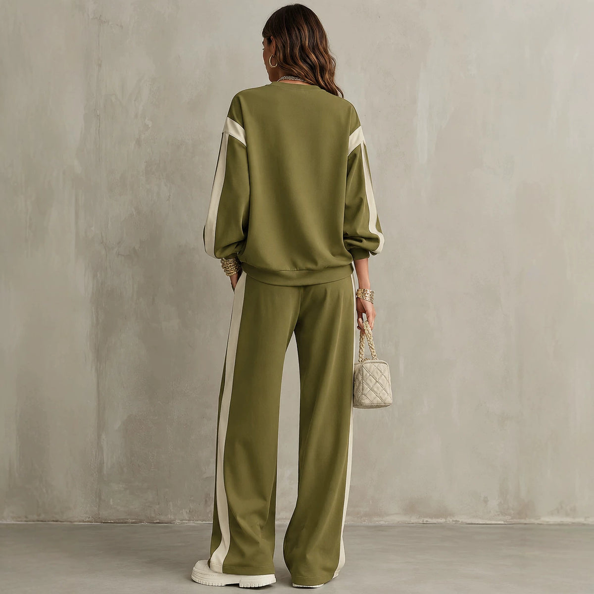 Olive sweatshirt and wide-leg pants set, back view showing contrast side panels