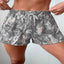Abstract maple leaf print shorts with tie waist — primary view