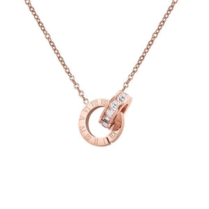 Rose gold-tone double ring pendant necklace with Roman numerals