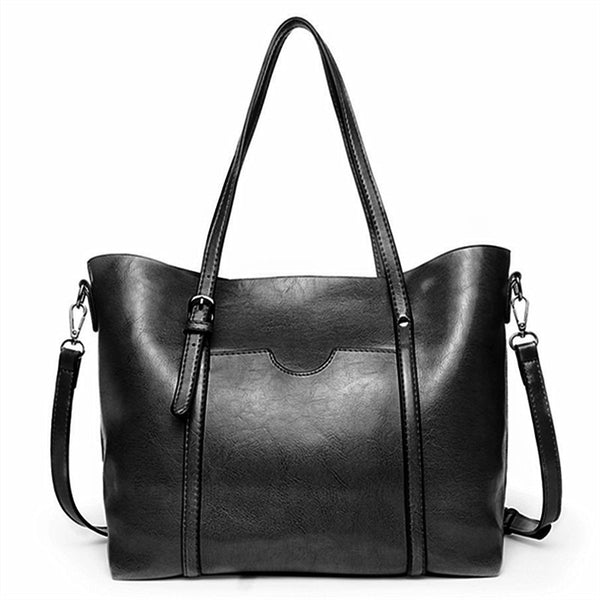 Retro tote bag shown carried crossbody