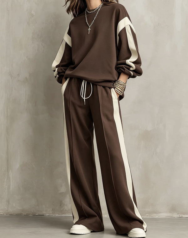 Brown sweatshirt and wide-leg pants set with cream contrast panels, worn by a model