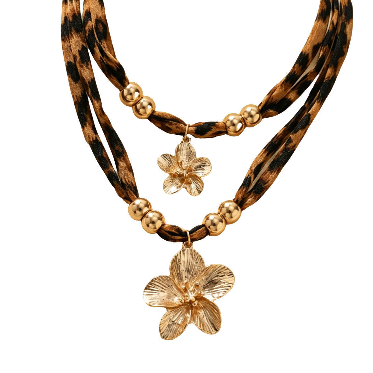 Leopard-print cord necklace with gold-tone beads and flower pendants on white