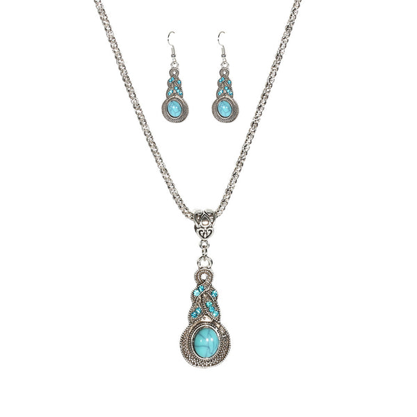 Silver-tone turquoise-colored teardrop pendant necklace with matching drop earrings