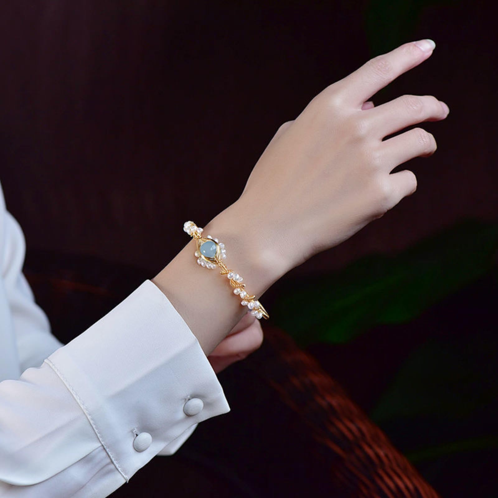 Product detail photo of Gold Tone Pearl Braided Bracelet, gold tone pearl braided bracelet