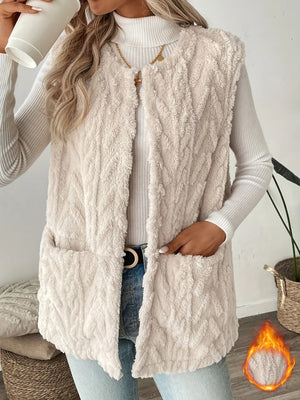 Cream textured plush vest showing the open front and patch pockets