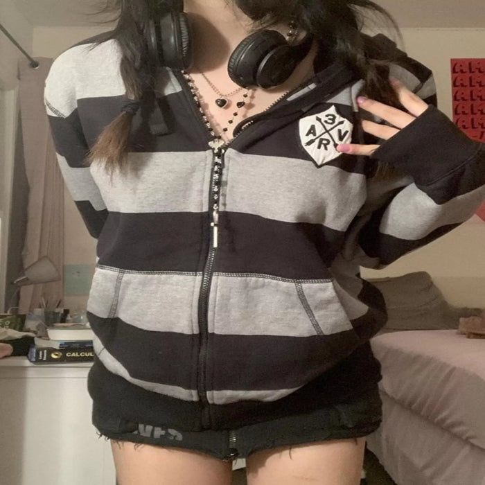 Model wearing the Striped Zip-Up Hoodie