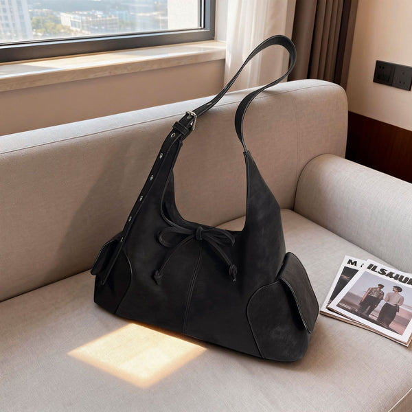 Large-capacity bag shown carried on shoulder