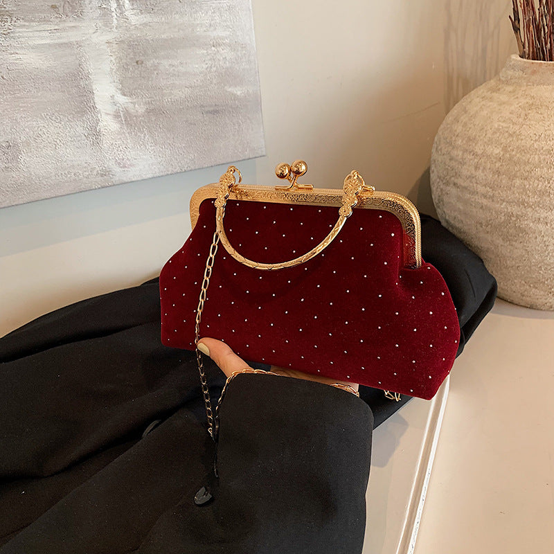 Shell crossbody bag rhinestone detailing close-up