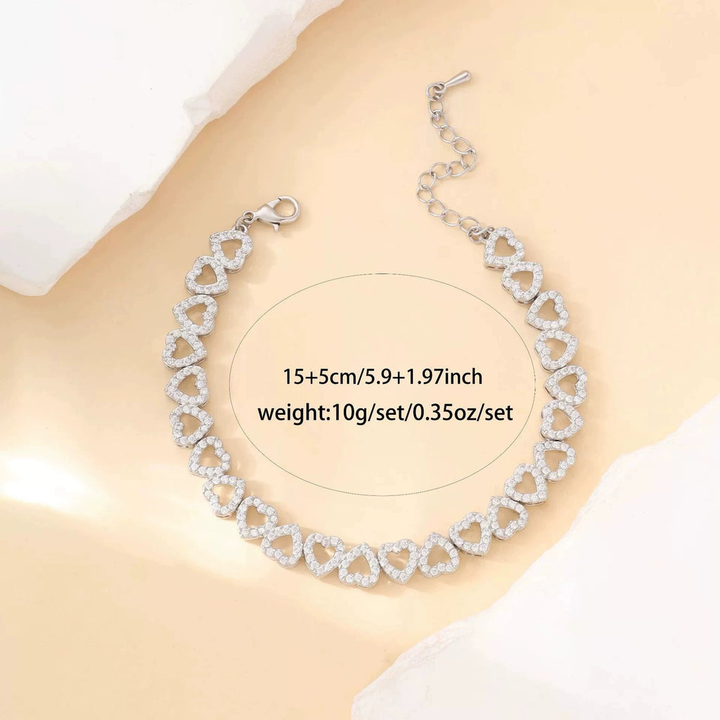 Minimalist heart charm bracelet worn on wrist - view 3