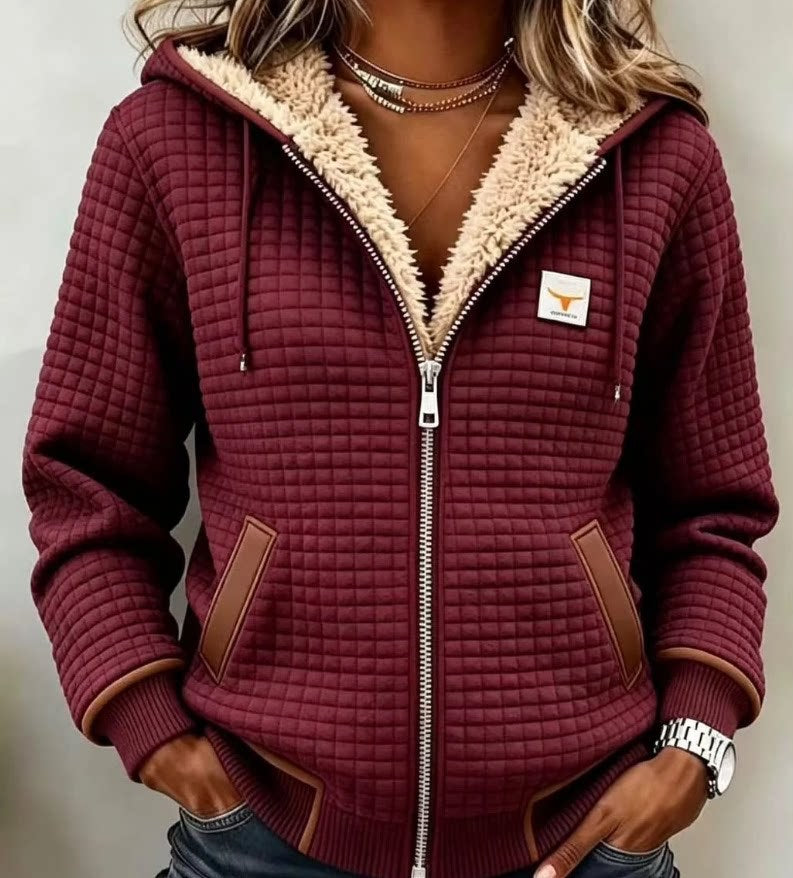 Burgundy waffle-textured zip-up hoodie with plush lining and brown trim