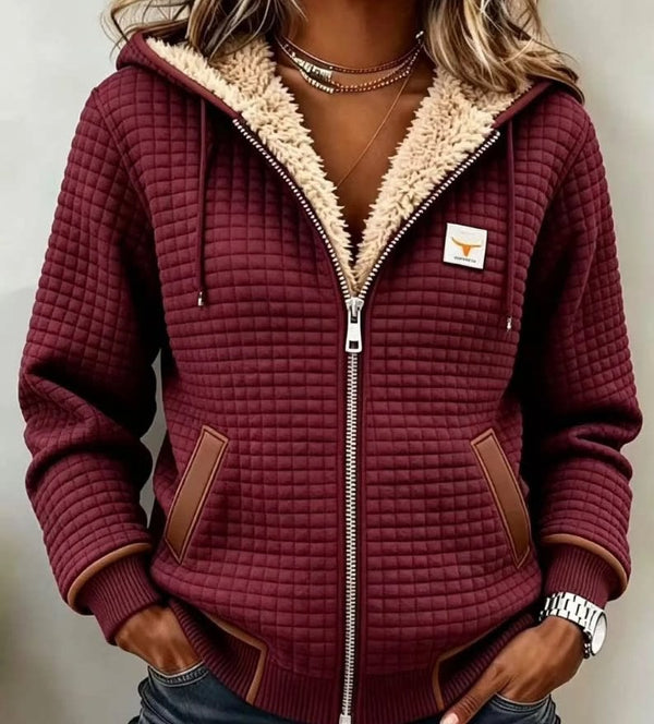 Burgundy waffle-textured zip-up hoodie with plush lining and brown trim