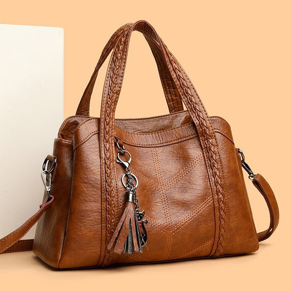 Tassel PU Handbag, shown in a clear product image