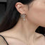 Flower pearl drop earrings in silver-plated alloy — primary view