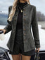 Double-breasted houndstooth coat, pattern detail