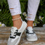 Round toe lace up sneakers in black and red — primary view