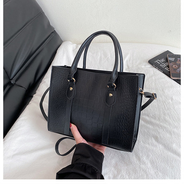 Shoulder tote bag shown carried crossbody